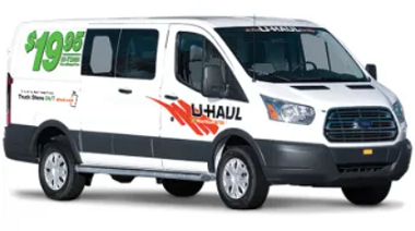 U-Haul Cargo Van with $19.95 advertised on the side of the van